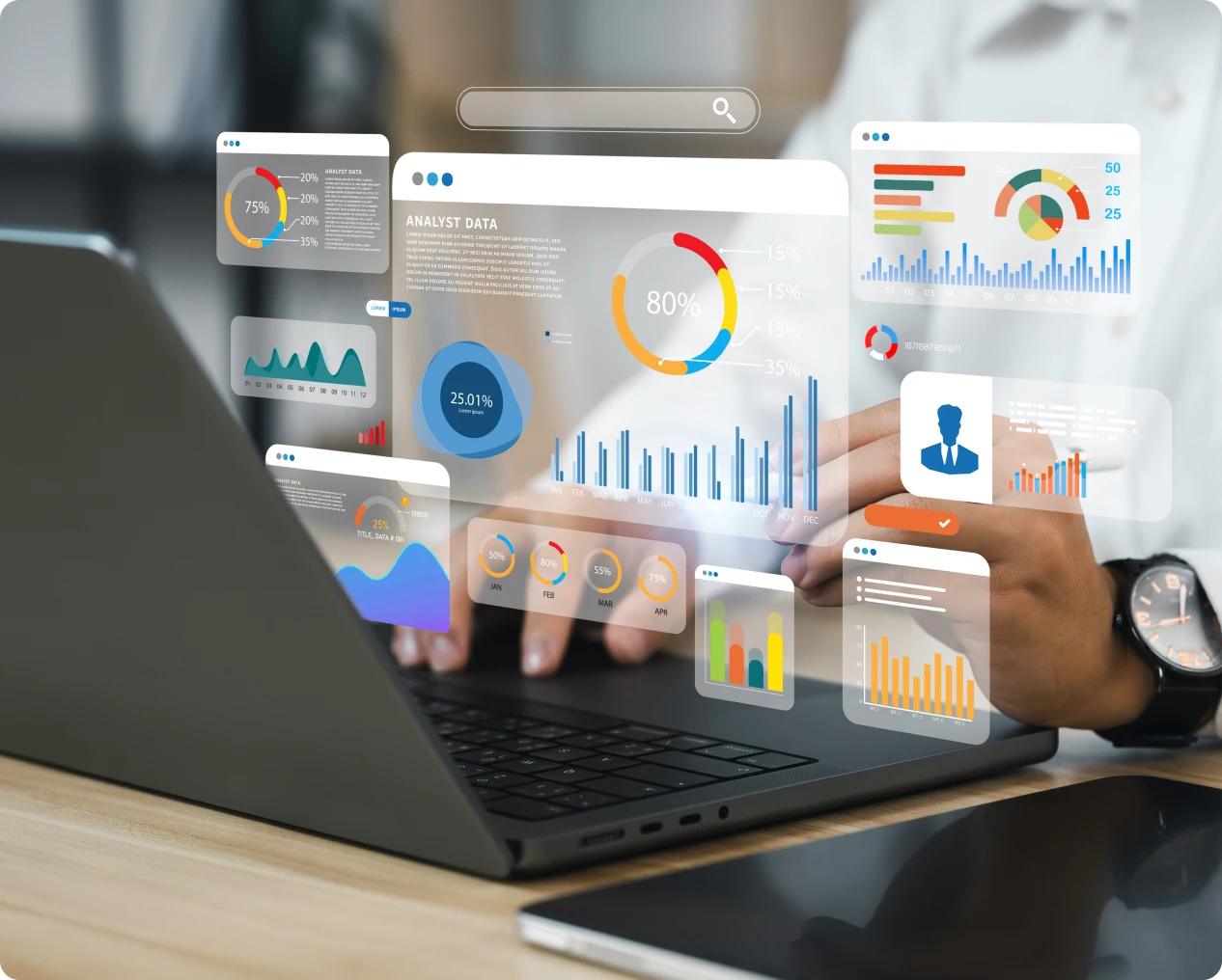 Person analyzing data on laptop with graphs.